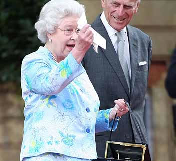 After being presented with her 'stolen' handbag at the end of the show, The Queen retrieves her speech and her reading glasses. In the speech, Her Majesty talked of the 'extraordinary success story' of British children's literature. 